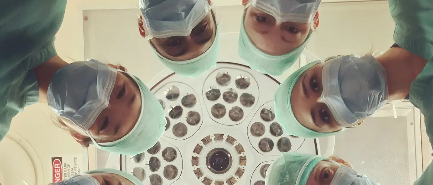 Surgical team seen from below for healthcare marketing services