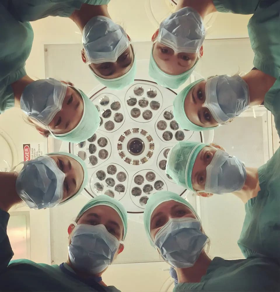 Surgical team seen from below representing healthcare reputation management