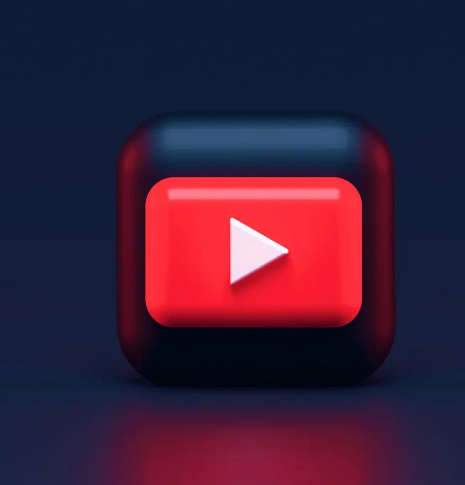 YouTube play button graphic representing social media marketing for astrologers